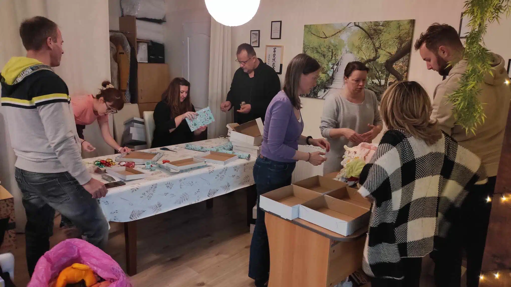 HLI Hungary volunteers putting together Christmas charity boxes