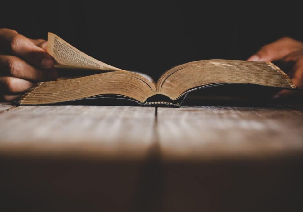 Sunday readings bible, a christian man reading the bible.